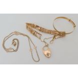 A 9ct baby's bangle, a gate bracelet and a 9ct gold flower design chain, weight together 19.2gms