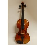 A two piece back violin 35cm with a part bow Condition Report: Available upon request