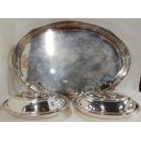A lot comprising a pair of silver plated entree dishes and an oval serving tray, 60cm x 41cm