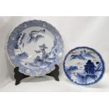 A large Japanese dish painted with mountainous landscape 40cm and another smaller dish 25cm