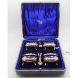 A cased set of four silver salts, Birmingham 1908 each 6.2cm diameter, 165gms Condition Report: