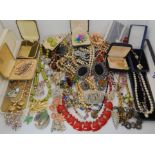 A large collection of vintage costume jewellery to include, Damascene cufflinks, beads etc Condition