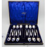 A cased set of twelve silver teaspoons with tongs, Sheffield 1897 Condition Report: Not available