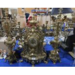 A large gilt metal clock and candelabra garniture, the clock movement marked Germany FHS, clock 60cm