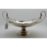 A silver twin handled pedestal bowl, Sheffield 1918, 29cm across the handles, 472gms Condition