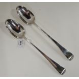A pair of silver plated basting spoons, 33cm long Condition Report: Not available for this lot