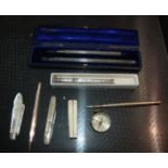 A white-metal propelling pen/pencil, cased pencil, folding scissors, silver blade pocket knife etc