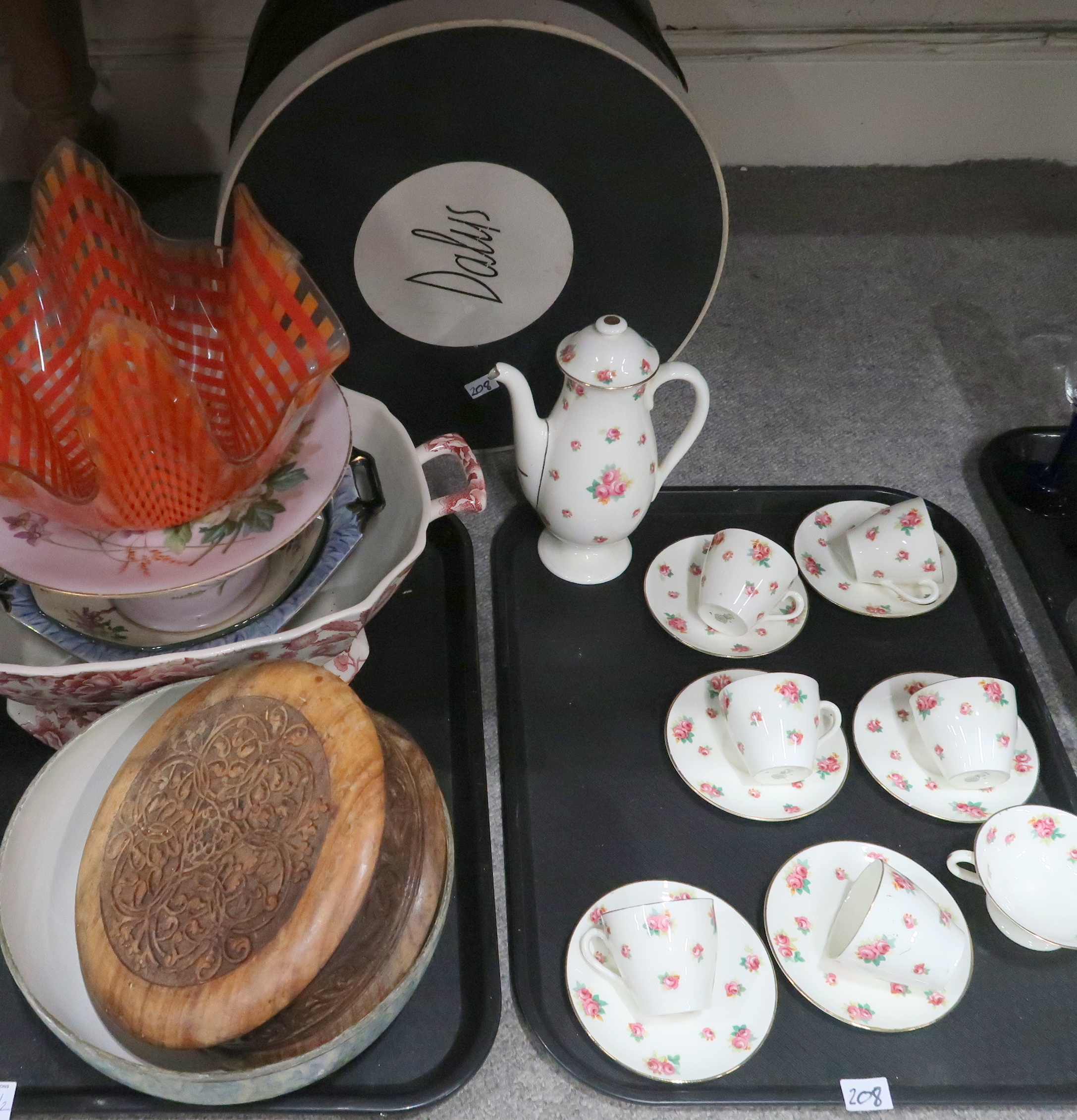 A Royal Doulton coffee set decorated with pink roses, an orange cross hatched handkerchief vase, a