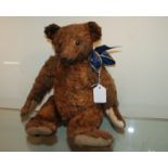 An early Teddy bear possibly a Steiff example, 38cm high Condition Report: Available upon request