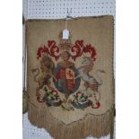 An embroidered banner and two resin crests, 50 x 46cm and smaller (3) Condition Report: Available