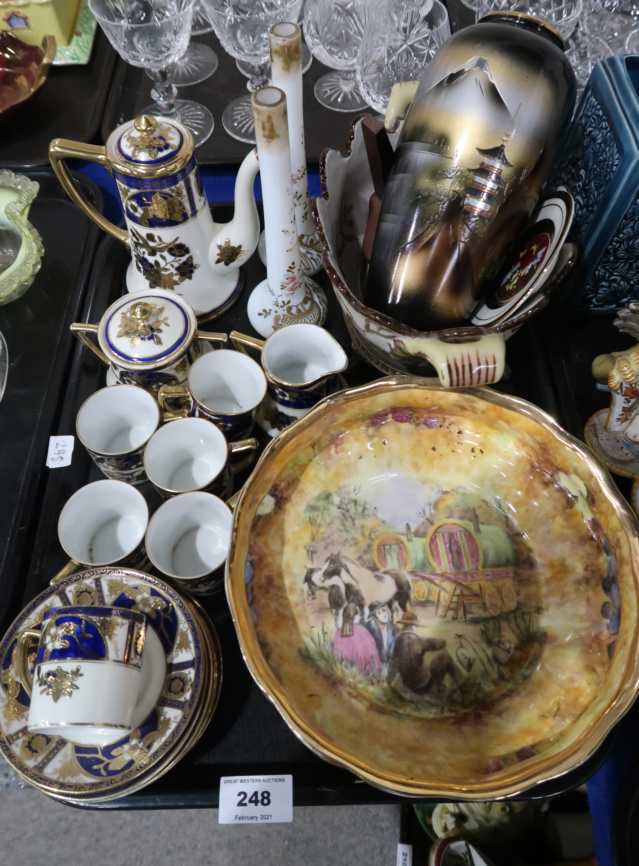 A Baroness China bowl painted with fruit and a scene of travellers, a Noritake coffee set with