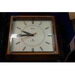 A National electric wall clock and brass plaque on hardwood (2) Condition Report: Available upon