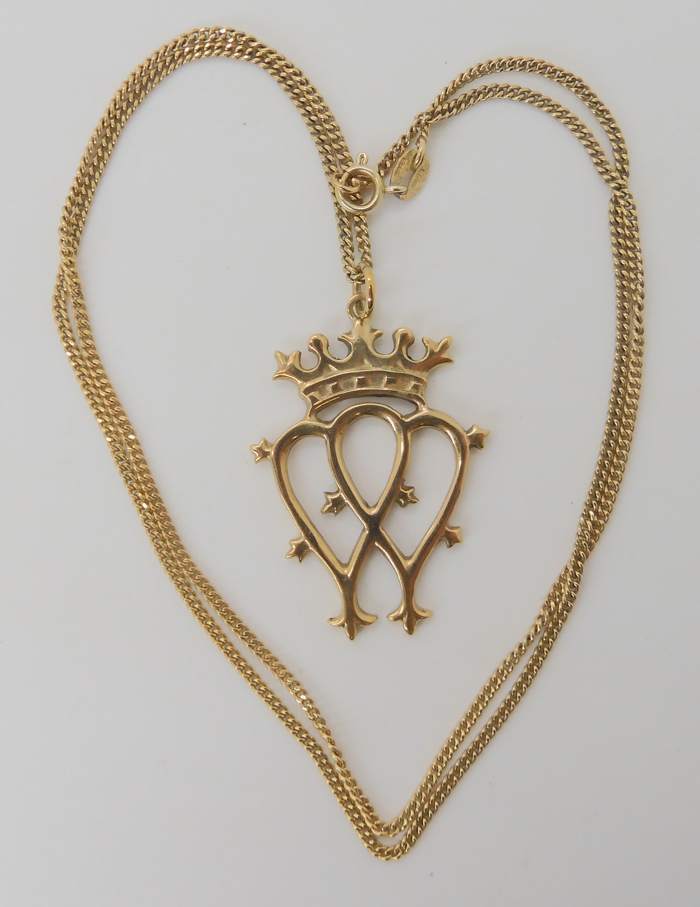 A 9ct gold luckenbooth and chain, length of pendant 4.4cm, chain 55cm, weight 11gms Condition