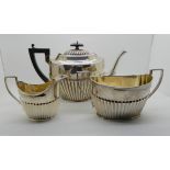 A three piece silver tea service, Birmingham 1896 and 1897, 916gms Condition Report: Not available