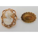 A 9ct mounted shell cameo brooch of Athena weight approx 9gms, and a 15ct gold ruby and diamond