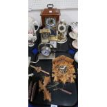 A collection of clocks including a cuckoo clock Condition Report: Not available for this lot