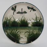 A Griselda Hill pottery Wemyss ware 'Dragonfly' patterned plate with painted backstamp, diameter