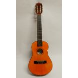 A Lauren 1/4 size nylon strung acoustic guitar Condition Report: Available upon request