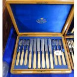 A cased twenty four piece fish cutlery set Condition Report: Not available for this lot