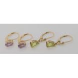 A pair of 9ct gold peridot earrings together with a pair of amethyst earrings, weight combined 2.