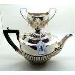 A silver teapot with matching sugar bowl, Sheffield 1915, 1003gms Condition Report: Not available