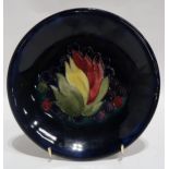 A Moorcroft Leaf and Berries plate, 18.5cm diameter Condition Report: Available upon request