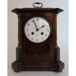 AN EDWARDIAN MANTLE CLOCK the white dial with Arabic numerals and marked Ramsay Dundee, the French