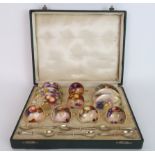 SIX BOXED ROYAL WORCESTER DEMITASSE CUPS AND SAUCERS each painted with fruit and signed by Ricketts,