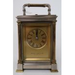 A SILVER PLATE AND BRASS REPEATER CARRIAGE CLOCK the gilded dial with Roman numerals and marked
