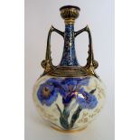 A ROYAL CROWN DERBY PORCELAIN TWO HANDLED VASE of bottle form, the cream glazed body with blue and