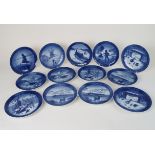 A COLLECTION OF ROYAL COPENHAGEN YEAR PLATES including 1945 depicting an angel, 1956 Rosenborg