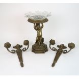 A PAIR OF BRASS CANDLE WALL SCONCES 38cm high, together with a cherub centrepiece, modelled