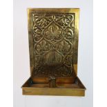 ALEXANDER RITCHIE, IONA BRASS WALL CANDLE SCONCE the backplate embossed with Viking Ship motif and