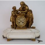 A LATE 19TH CENTURY FRENCH MANTLE CLOCK the alabaster base with gilded scholar and child studying