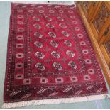 A red ground Turkeman rug, 162cm x 114cm Condition Report: Available upon request