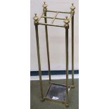 A brass four section umbrella/stick stand, Condition Report: Available upon request