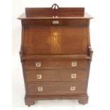 A Glasgow style Wylie Lochhead writing desk probably designed by Ernest Archibald Taylor, with