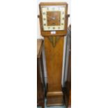 An Art Deco walnut grandmother clock, 143cm high Condition Report: Available upon request