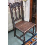 A carved oak hall chair Condition Report: Available upon request