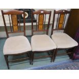 Three mahogany Art Nouveau chairs with a flower inlay back panel (3) Condition Report: Available