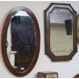 An oak wall mirror and an oval mahogany wall mirror, (2) Condition Report: Available upon request