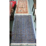 A Blue ground Bokhara rug, 166cm x 93cm, a modern Kazak wool rug, 157cm x 80cm , a Turkish rug