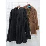 Black velvet cape, fur stoles, a satin cape, a green leather jacket, a brown leather jacket and a