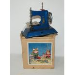 A childs Little Betty sewing machine in original box Condition Report: Available upon request