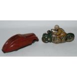 A Schuco Sport tinplate motorcycle, green with brown rider and Schuco Kommando both (af) (2)