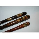 Two painted hardwood truncheons, 38cm lond and smaller truncheon, 27cm long (3) Condition Report: