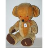 A large Merrythought Cheeky Teddy bear, 62cm long Condition Report: Available upon request