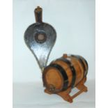 A small oak barrel, 28cm wide (af) and a pair of bellows Condition Report: Available upon request