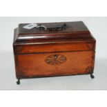 An inlaid two division tea caddy with hinged lid on claw feet, 26cm wide (af) Condition Report: