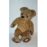 A large Chad Valley Teddy bear, 50cm long Condition Report: Available upon request